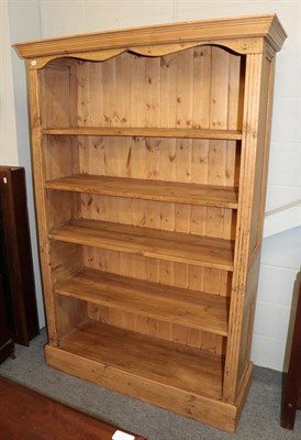 Lot 1285 - A 20th century pine open bookcase, 122cm by 42cm by 183cm