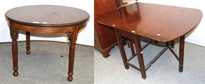 Lot 1277 - A mahogany gateleg table, 140cm by 97cm by 78cm, together with a reproduction circular coffee table