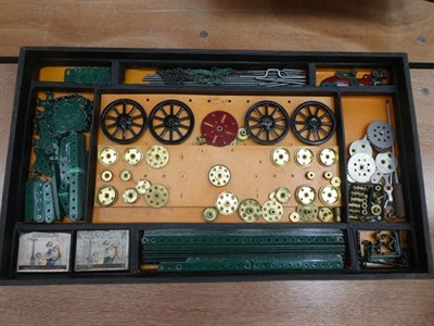 Lot 3200 - Meccano Engineering For Boys Outfit No.5 red/green parts strung onto original card inserts,...