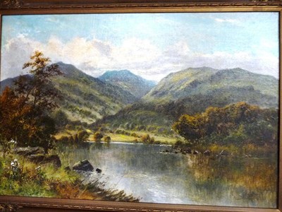 Lot 831 - Attributed to Daniel Sherrin (fl.1895-1915) River landscape with hills in the distance Oil on...