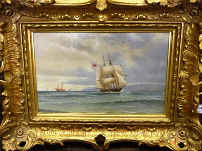 Lot 864 - Henry Hare (19th/20th century) Sailing vessel near a lightship, a headland beyond Indistinctly...