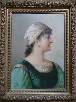 Lot 891 - Daniel Hock (1858-1934) Austrian Portrait of a girl, head and shoulders, wearing a green dress...