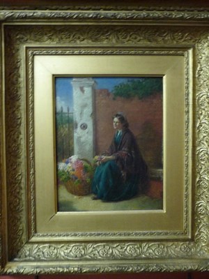 Lot 936 - George Augustus Freezor (fl.1861-1879) Girl selling flowers beside a gateway Signed (18)69, oil...