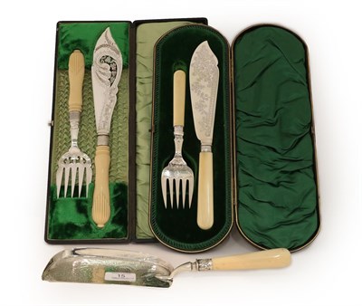 Lot 15 - A Cased Pair of Victorian Silver-Mounted Ivory Handled Fish-Servers, by Cooper Brothers, Sheffield