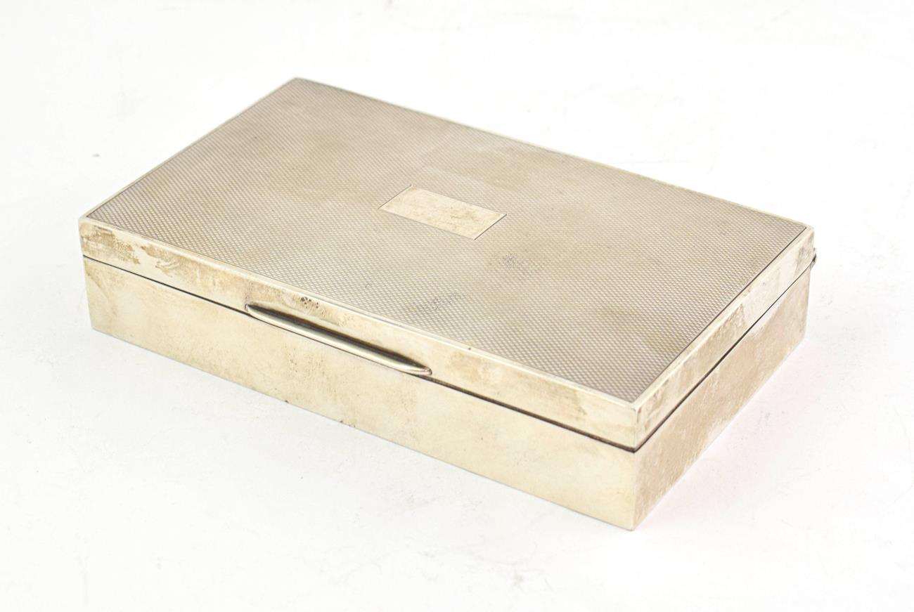 Lot 51 - A George VI Silver Cigarette-Box, by Harman Brothers, Birmingham, 1951, oblong, the hinged...