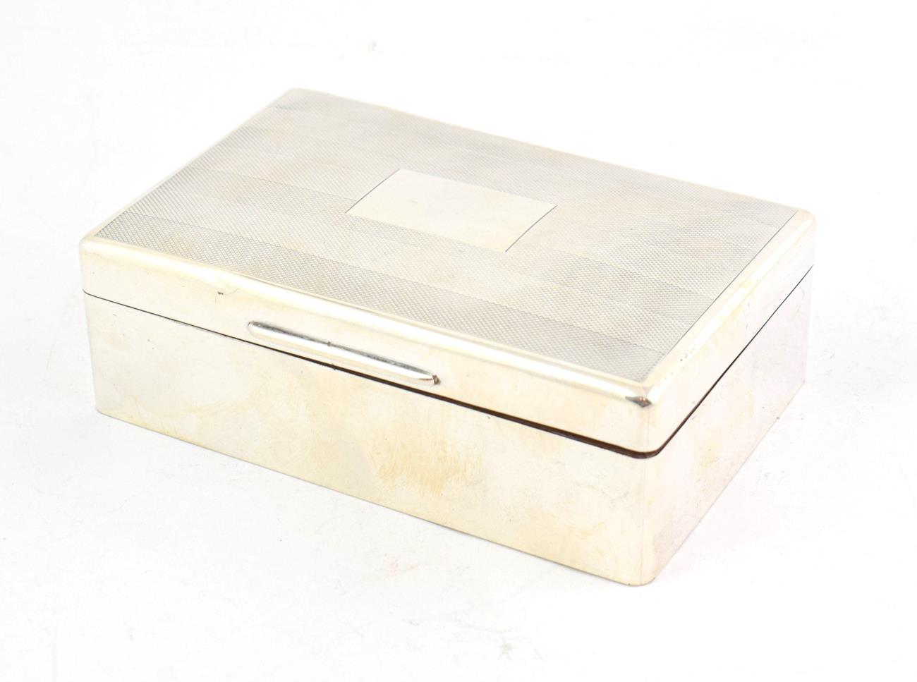 Lot 53 - An Elizabeth II Silver Cigarette-Box, by W. T. Toghill and Co,, Birmingham, 1956, oblong, the...