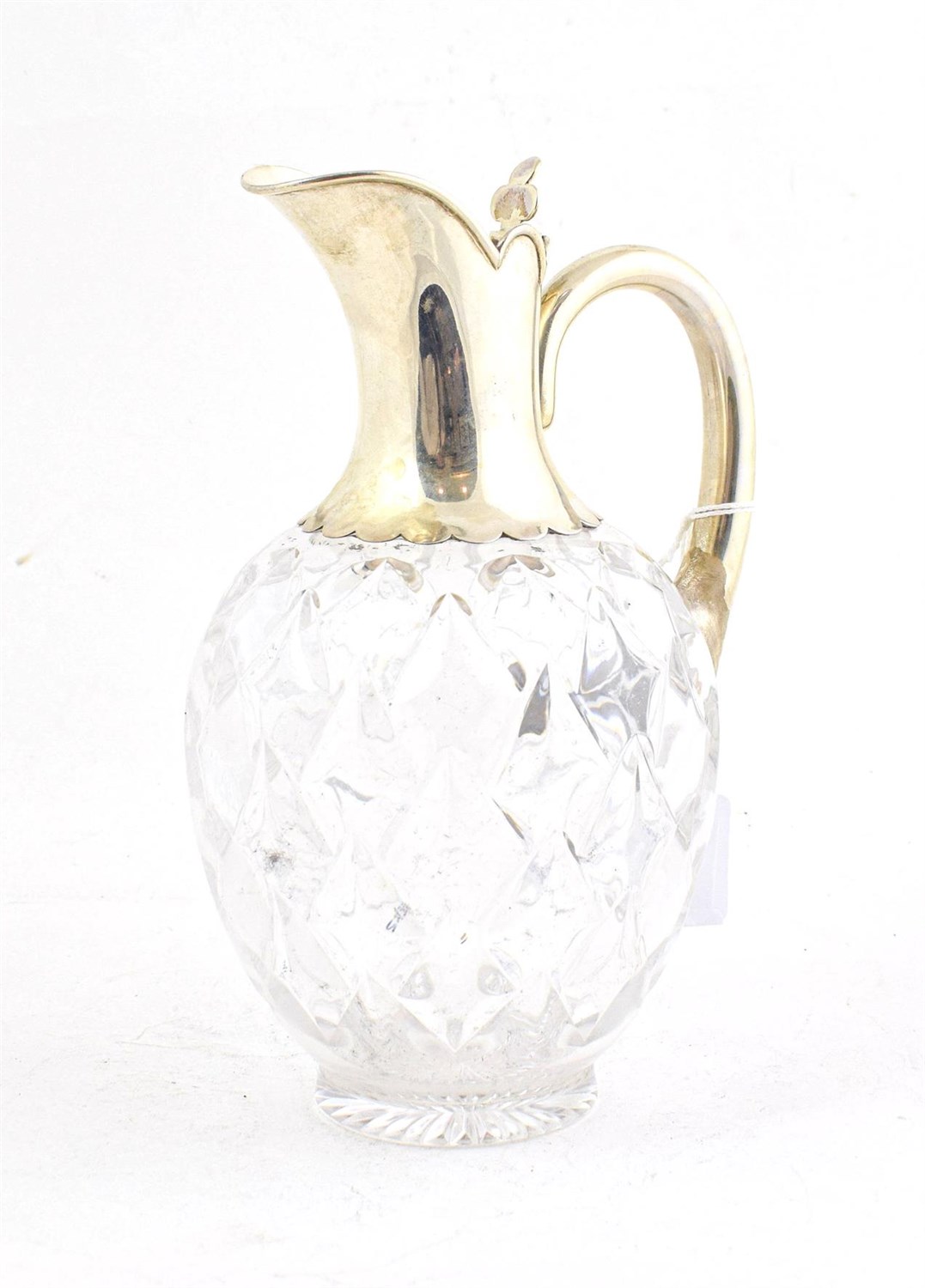 Lot 54 - A Victorian Silver-Mounted Glass Claret-Jug, by John Grinsell and Sons, London, 1897. The...