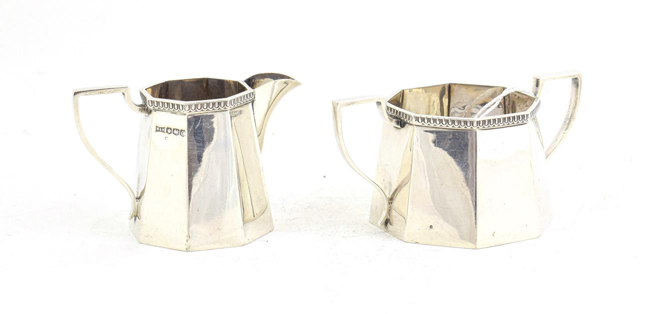 Lot 59 - A George V Silver Cream-Jug and Sugar-Bowl, by Walker and Hall, Sheffield, 1920, each tapering...