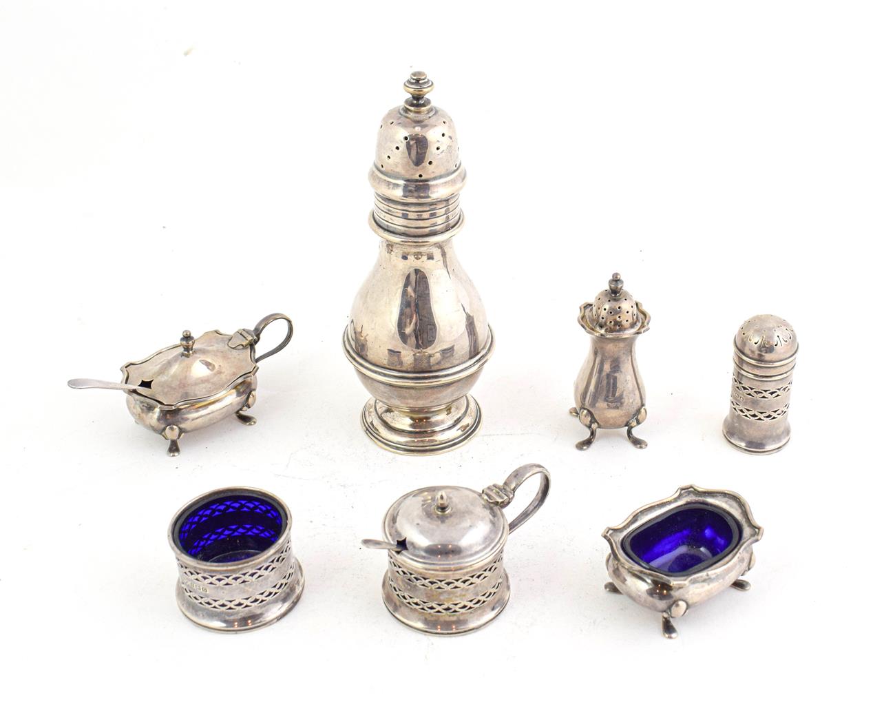 Lot 67 - An Edward VII silver sugar caster, by Wakely and Wheeler, London, 1905, 16.5cm high; together...