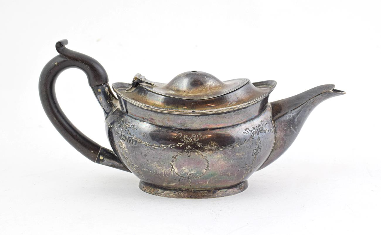 Lot 71 - An Edward VII Silver Teapot, by Nathan and Hayes, Chester, 1909, tapering oval, the sides...