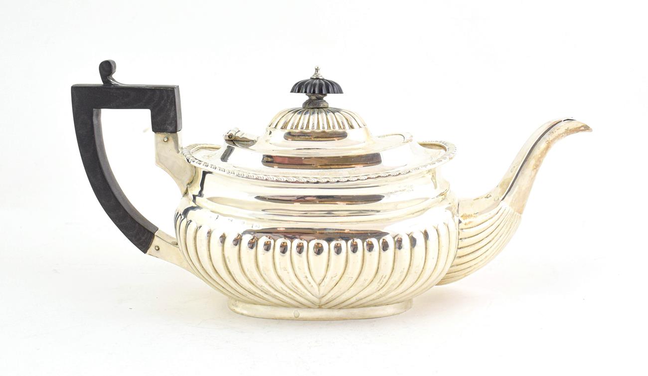 Lot 73 - A Victorian Silver Teapot, Probably by Thomas Hayes, Birmingham, 1898, oval and with part...