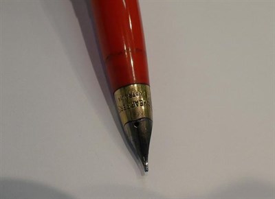 Lot 124 - A Dupont gilt-metal ballpoint pen, with refill; a Sheaffer Australia fountain-pen; a chromed pencil