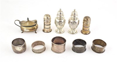 Lot 126 - A collection of assorted silver, including: a pair of George V silver pepperettes, by Docker...