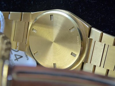 Lot 2124 - An 18 Carat Gold Automatic Calendar Centre Seconds Wristwatch with the Red ''Khanjar'' National...