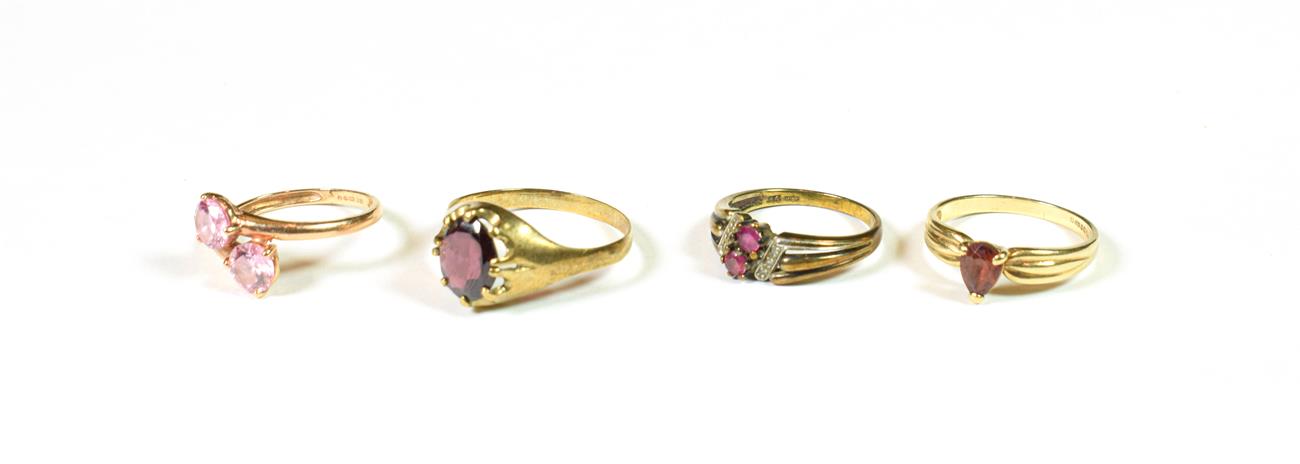 Lot 139 - A 9 carat gold cubic zirconia ring, finger size N; two 9 carat gold gem set rings; and a...