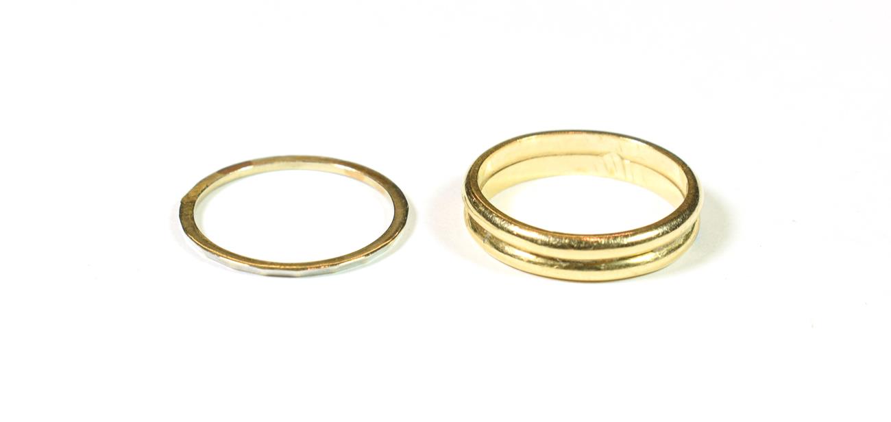 Lot 141 - A double band ring, unmarked, finger size S1/2; and another, finger size S