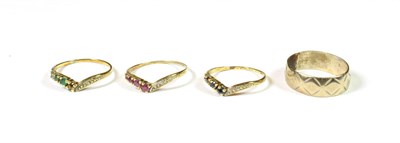 Lot 150 - Three gem set stacking rings, stamped '585', finger size J1/2 (a.f.); and a 9 carat gold band ring