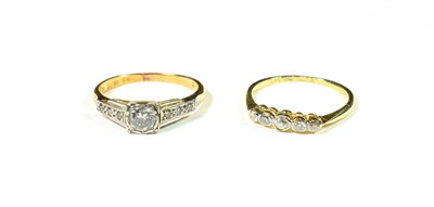 Lot 171 - A diamond five stone ring, the graduated old cut diamonds in white millegrain settings, to a yellow