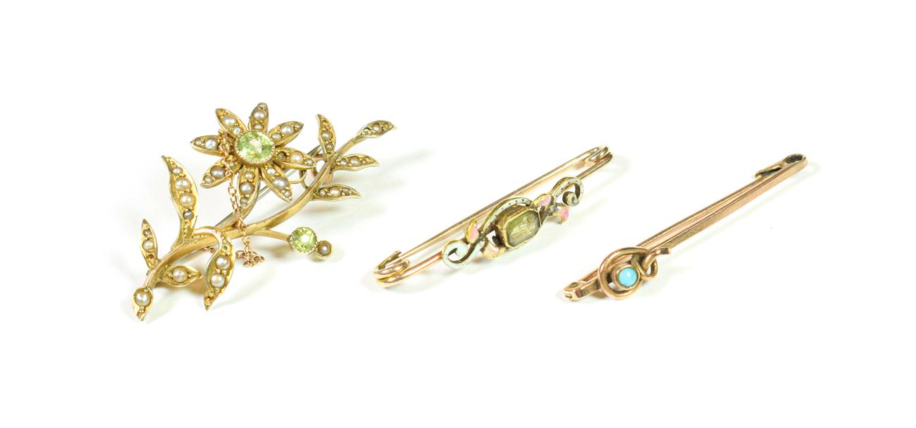 Lot 183 - A peridot and split pearl brooch, the floral spray set throughout with two round cut peridots...
