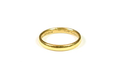 Lot 184 - A 22 carat gold band ring, finger size M