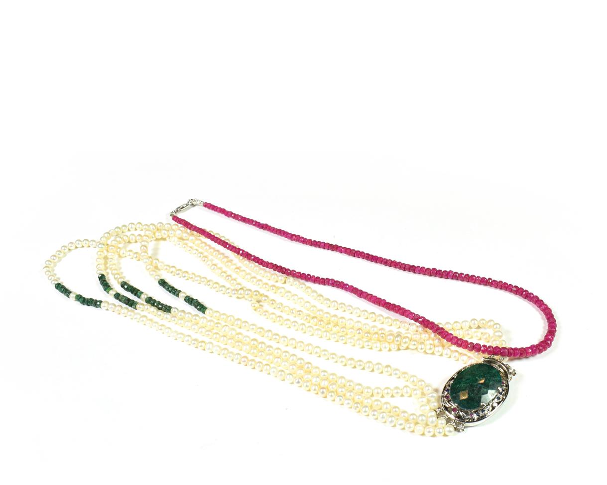 Lot 188 - A ruby bead necklace, length 47.5cm; and a cultured pearl four row necklace with an emerald...