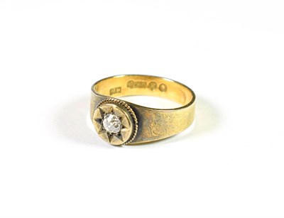Lot 197 - A 15 carat gold diamond solitaire ring, the old cut diamond within a yellow star setting to a...
