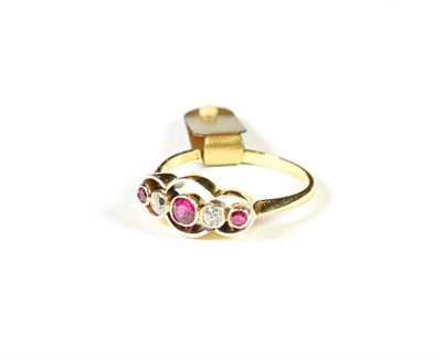 Lot 203 - A synthetic ruby and diamond five stone ring, three graduated round cut rubies alternate with...