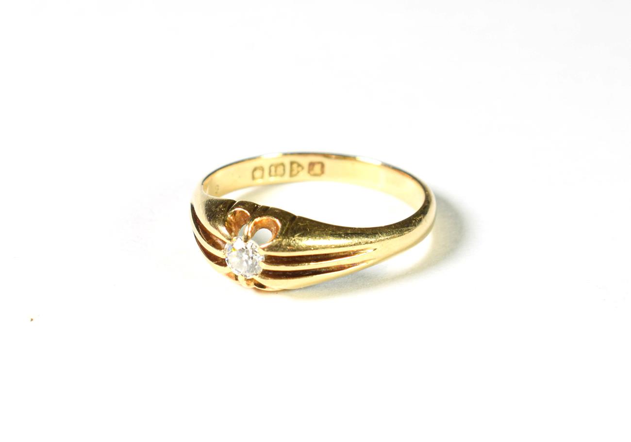 Lot 210 - An 18 carat gold diamond solitaire ring, the round brilliant cut diamond in a yellow claw...