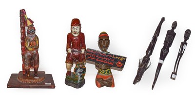 Lot 226 - A Nigerian carved wooden figure with five various others (6)