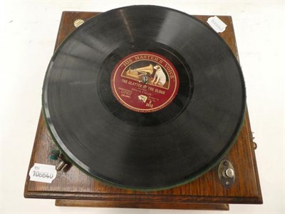Lot 230 - An oak wind-up table gramophone together with HMV style dog, a bakelite radio etc
