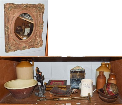 Lot 233 - A shelf of stoneware flagon's, earthenware mixing bowl, African items, Barbola mirror and a...