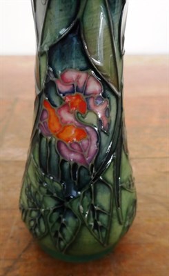 Lot 246 - A Moorcroft Rose of the forest pattern vase, designed by Philip Gibson, impressed factory marks and