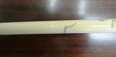 Lot 261 - A Japanese ivory mounted Bamboo walking cane, Meiji period, the handle carved in low relief...