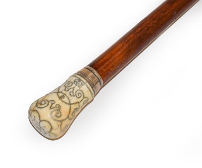 Lot 268 - A ivory and pique mounted malacca walking cane, dated 1700, and initialled I.B with a white...