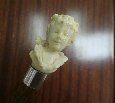 Lot 269 - An ivory mounted walking stick, late 19th century the handle carved as the bust of a girl, 86cm