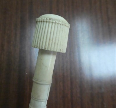 Lot 272 - A Chinese ivory mounted walking stick, late 19th century, the handle carved with a figure,...