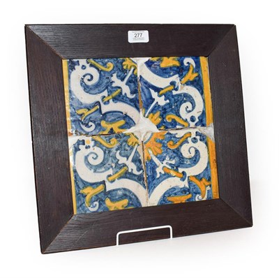 Lot 277 - A framed set of four 17th/18th century polychrome Maiolica tiles, 28cm