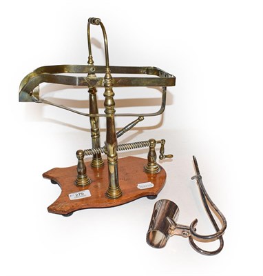 Lot 279 - Plated wine decanting cradle and a wine bottle holder