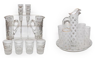 Lot 311 - An Asprey & Garrard part suite of glassware with acid etched marks, including two ewers, large pair