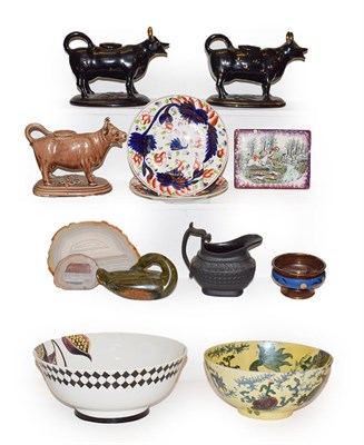 Lot 316 - A tray of mainly Victorian pottery including Jackfield type cow creamers, black basalt cream...
