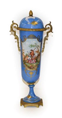 Lot 333 - A Sevres porcelain gilt metal mounted vase and cover decorated with a vignette of a courting couple