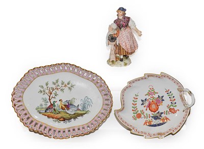 Lot 335 - A Meissen figure of a lady, 14cm (a.f.) together with two 20th century Meissen dishes, largest 29cm