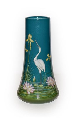 Lot 343 - A Jerome Massier Vallauris pottery vase, painted with a stork in irises and lilies, printed factory