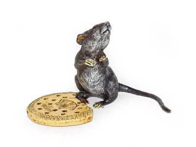 Lot 362 - A cold painted bronze advertising figure of a rat on a biscuit, inscribed Cao Biscuits, 12cm high