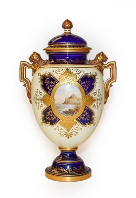 Lot 369 - A Coalport vase and cover decorated with a vignette of a coastal scene, 25cm