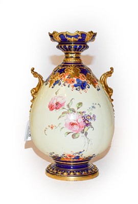 Lot 378 - A Royal Crown Derby twin-handled vase, painted with floral sprays on a cream ground with cobalt...