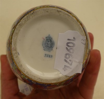 Lot 382 - A Royal Worcester Hadley ware twin-handled pedestal rose bowl enamelled with flowers, 19cm...