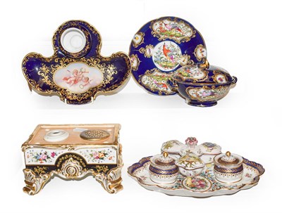 Lot 395 - Three 19th century Continental porcelain inkwells, a similar ecuelle and a faience trinket box...