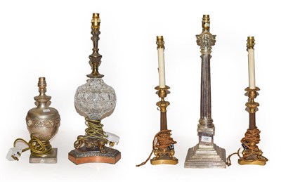 Lot 428 - A quantity of table lamps to include a large silver plated example formed as a Corinthian...