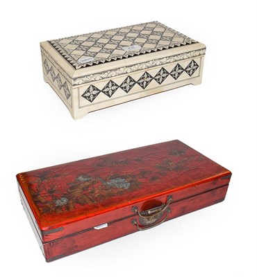 Lot 434 - A Chinese composite chess set with lacquered board and box, together with a bone mounted table...